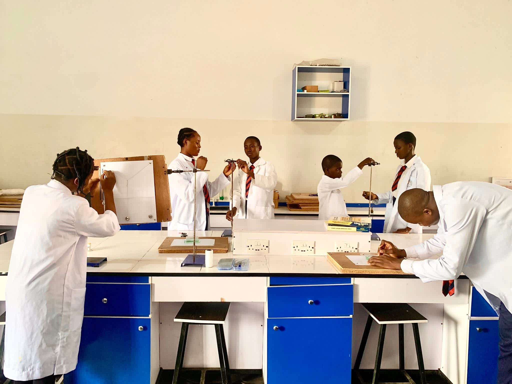 Students conducting experiments in the research lab